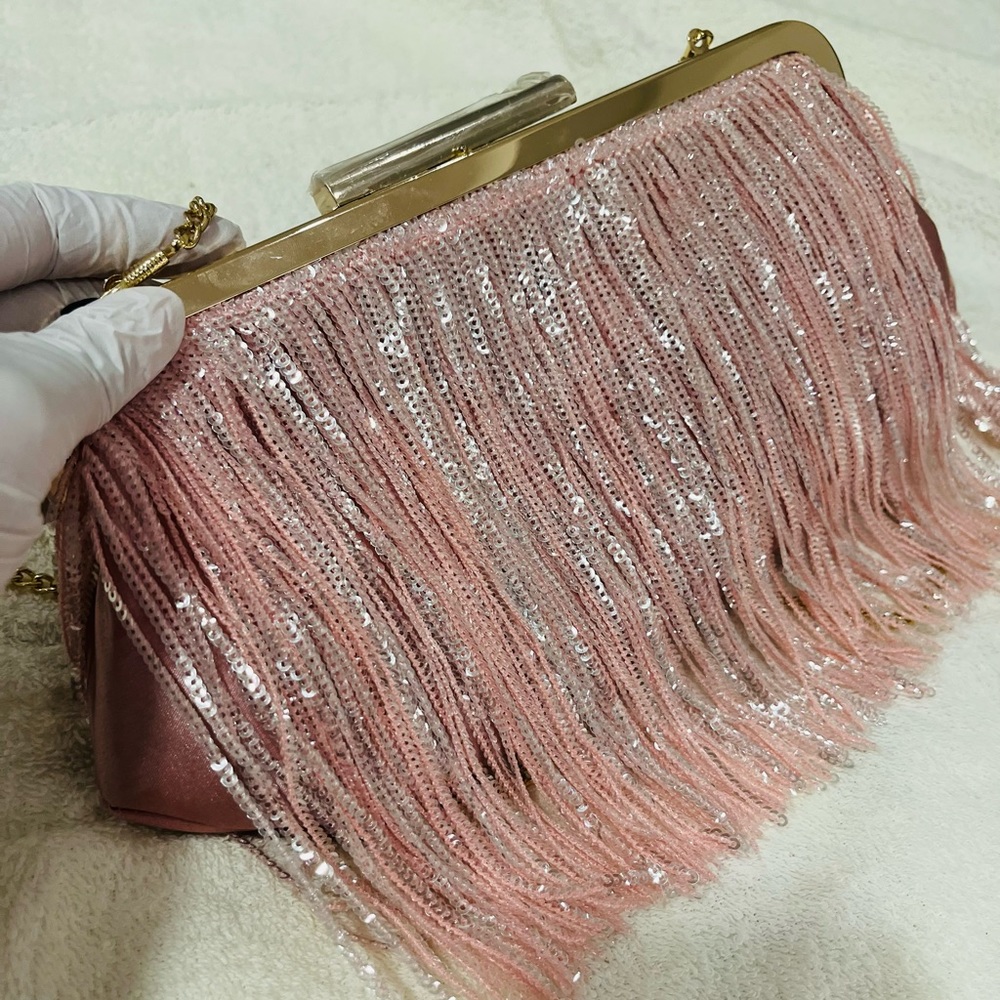 Pink Party Purse. Adds the perfect bling to a boring party. Brand: Insignia